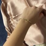 PAVOI 14K Gold Plated Forever Love Knot Infinity Bangle Bracelets for Women | Gold Bangle Bracelet for Women photo review