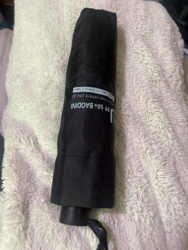 BAODINI Small UV Protection Travel Umbrella Compact for Rain and Sun UPF 50+ Windproof Portable 42 inch Umbrella for Women and Men photo review