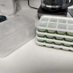 DOQAUS Ice Cube Tray with Lid and Bin - 4 Pack Silicone Ice Cube Trays for Freezer, Stackable Ice Bucket Kits with Storage Container & Scoop for Kitchen, RV, Cocktail, Coffee photo review