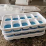 DOQAUS Ice Cube Tray with Lid and Bin - 4 Pack Silicone Ice Cube Trays for Freezer, Stackable Ice Bucket Kits with Storage Container & Scoop for Kitchen, RV, Cocktail, Coffee photo review